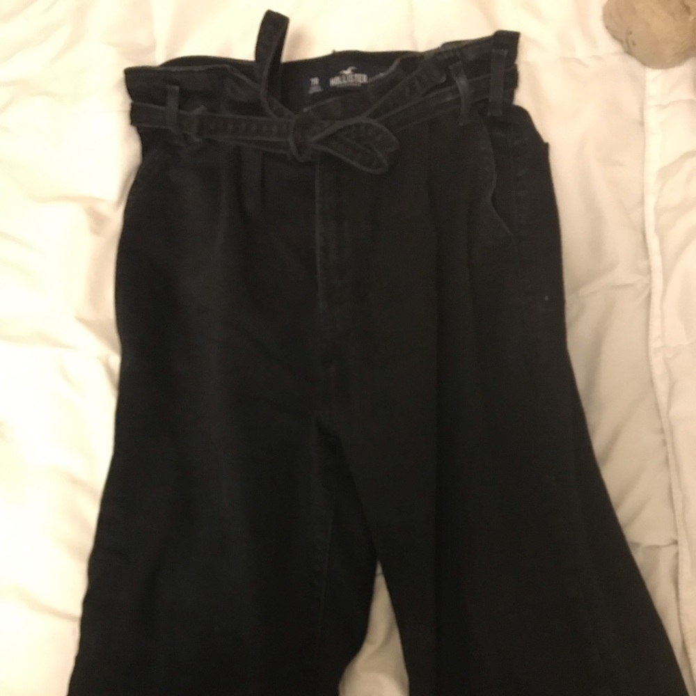 Black snitched waist jeans
